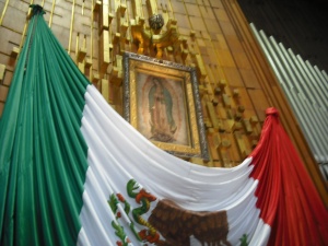 Juan Diego's tilma with some not-so-subtle symbolism below.